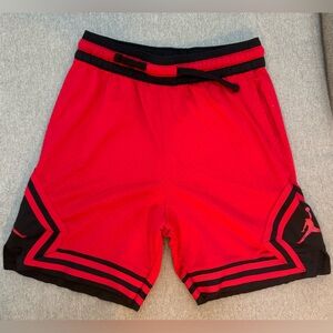 Men’s Nike Jordan dri-fit red and black shorts.  Size small.